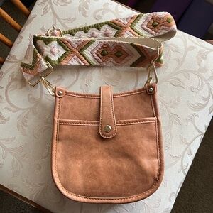 Stylish Tan Crossbody Bag with Patterned Strap